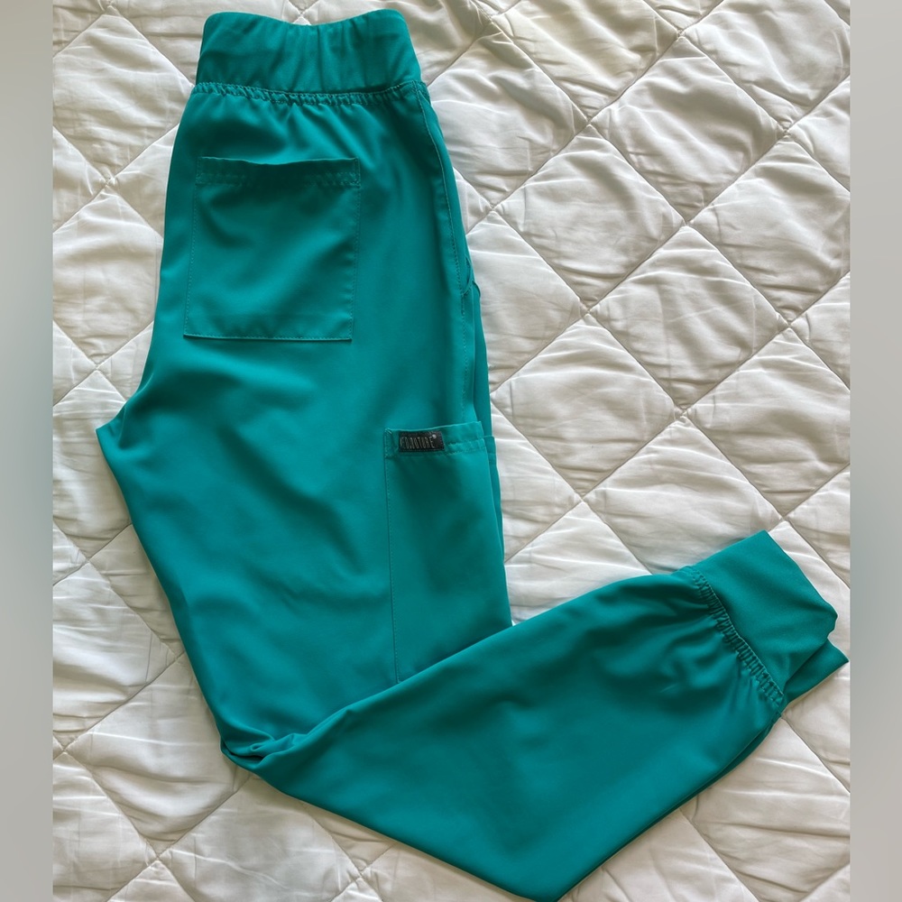 XS med couture insight jogger scrub pants color teal. Never worn